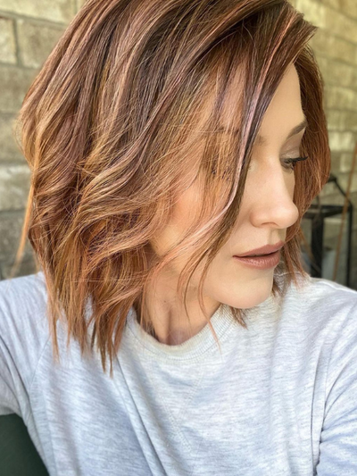 Kristyna Moore @kristynamoore wearing DELIGHT (heat-styled through the ends) by ELLEN WILLE in color ROSEWOOD ROOTED | Medium Brown, Caramel, and Rose Gold blend with Shaded Roots