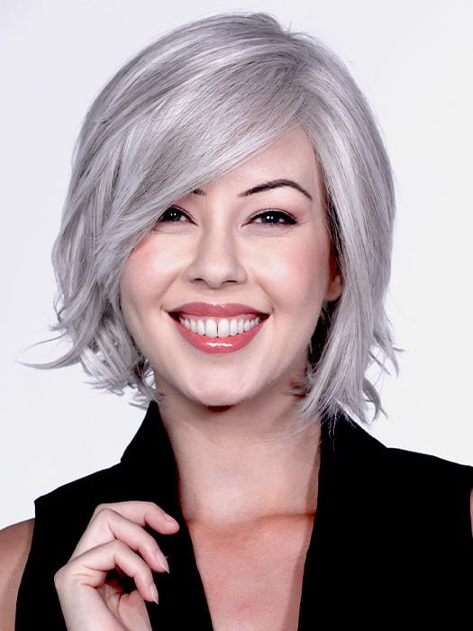 A medium bob with soft curls and subtle layers toward the bottom