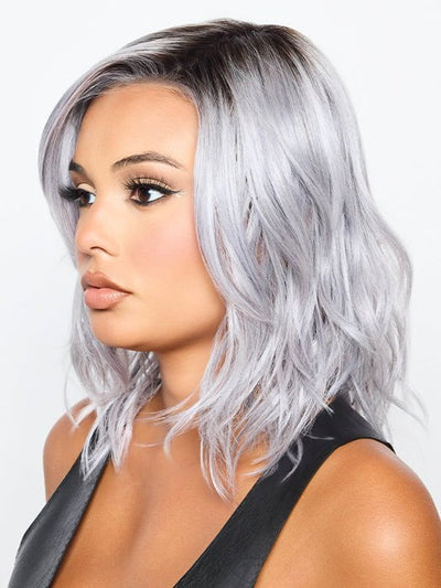 This heat friendly synthetic wig has subtle layers and ethereal beach waves