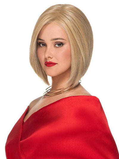 A medium asymmetrical bob with sleek hair that is precisely cut into face-flattering layers