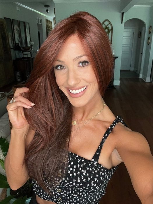 Jenna Fail @jenna_fail wearing GLAM by TRESSALLURE in color 10/130R | Bright Red with Medium Brown Roots