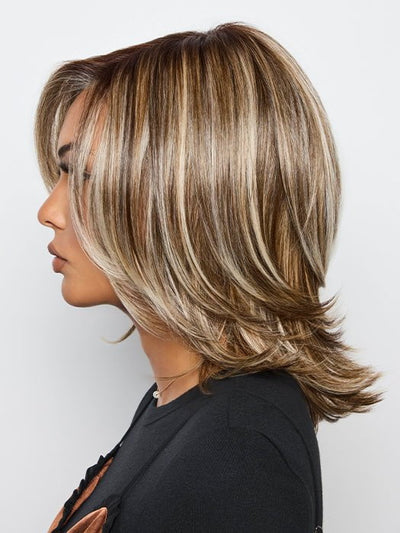 A mid length synthetic wig