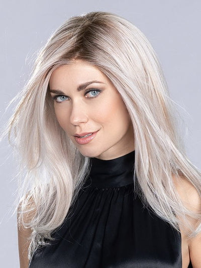 A long heat-friendly synthetic wig