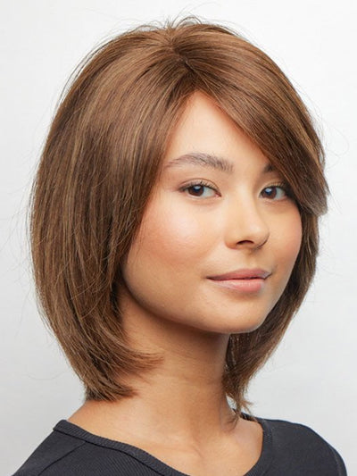 A medium-length human hair wig