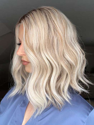 Sandy @i_be_wiggin wearing MIU by BELLETRESS in color BURNT BISCUIT BLONDE | A Blend of Sand, Honey, and Creamy Soft Blonde with a Medium Root
