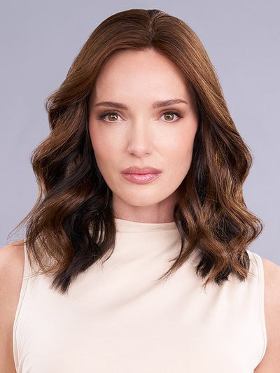 This hair topper's lightweight front gradually transitions to medium coverage at the crown and back