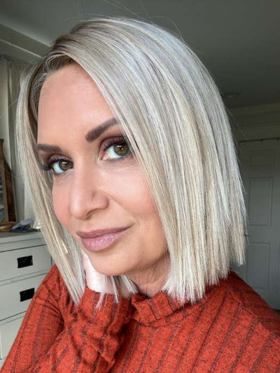 Emily H. @she_sheds_more wearing SANTA MONICA by BELLETRESS in color CRUSHED ALMOND BLONDE R | A soft Neutral Light Blonde with a Light and Medium Blended Root Color.
