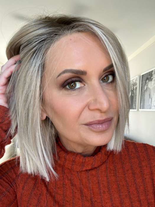 Emily H. @she_sheds_more wearing SANTA MONICA by BELLETRESS in color CRUSHED ALMOND BLONDE R | A soft Neutral Light Blonde with a Light and Medium Blended Root Color.
