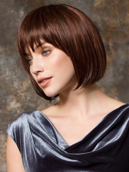 Have your stylist trim the bang to fit your face shape