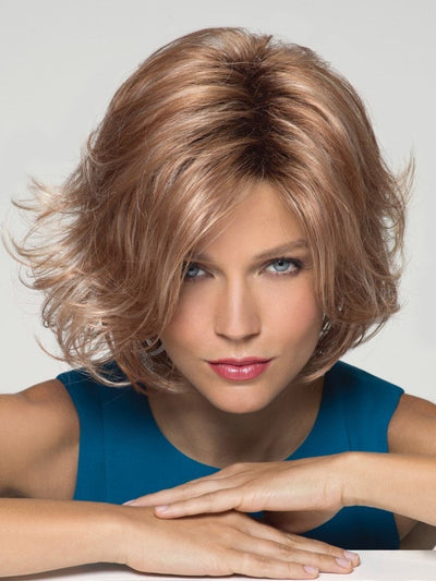 A beautiful chin-length, layered and voluminous synthetic wig