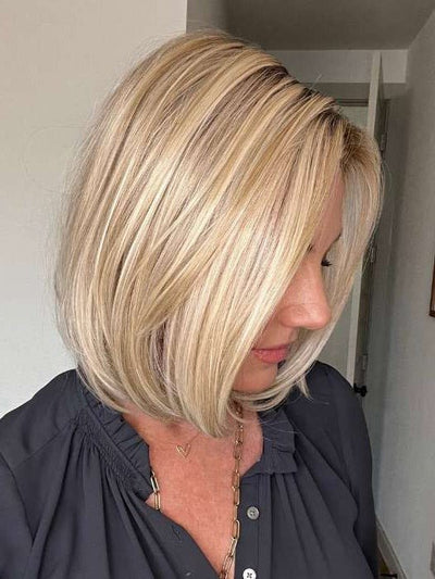 Jenny B. wearing HAUTE by JON RENAU in color FS17/101S18 PALM SPRINGS BLONDE | Light Ash Blonde with Pure White Natural Violet Bold Highlights, Shaded with Dark Natural Ash Blonde