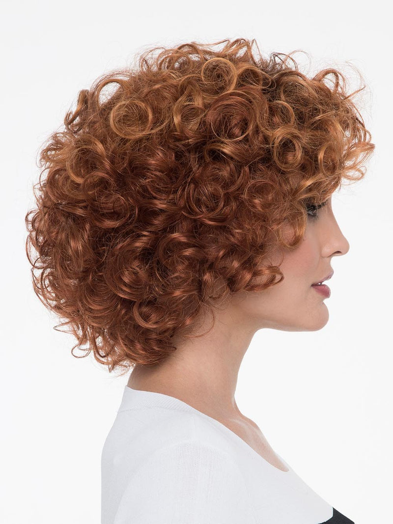 With a full head of bouncy curls, Kenya Wig by Envy has chin-length &