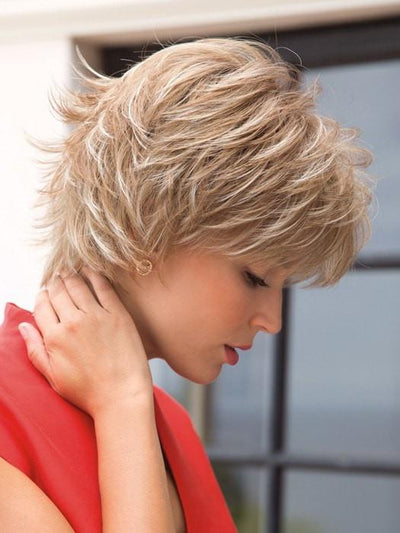 a short, wavy and textured hair style with a basic cap with open wefting, that is breathable, lightweight and provides built-in volume on top