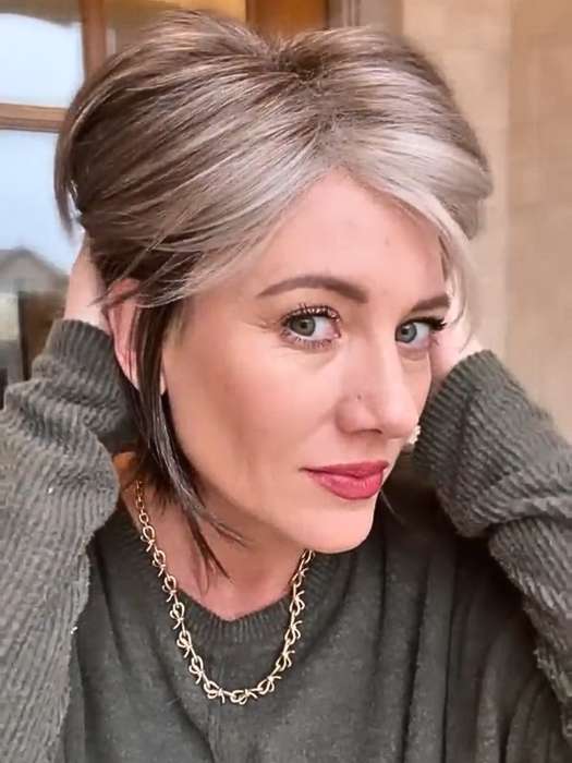 Jenny B. @thewiggygirl wearing REESE by NORIKO in color SANDY SILVER | Medium Brown Transitionally Blending to Silver and Dramatic Silver Bangs