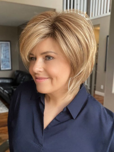 Donna @style.me.ageless wearing REESE by NORIKO in color NUTMEG F | Medium Blonde and Honey Brown Base Frosted with Platinum Blonde Highlights