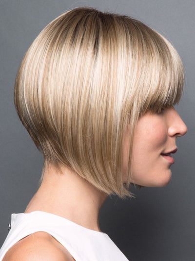 Look like you’ve just stepped out of the salon with this sleek angled cut that features bold, blunt bangs and a tapered back. 